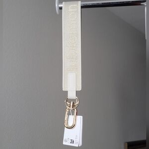 🍋 Lululemon Never Lost Keychain Metallic Wordmark *NWT* Light Ivory/Gold